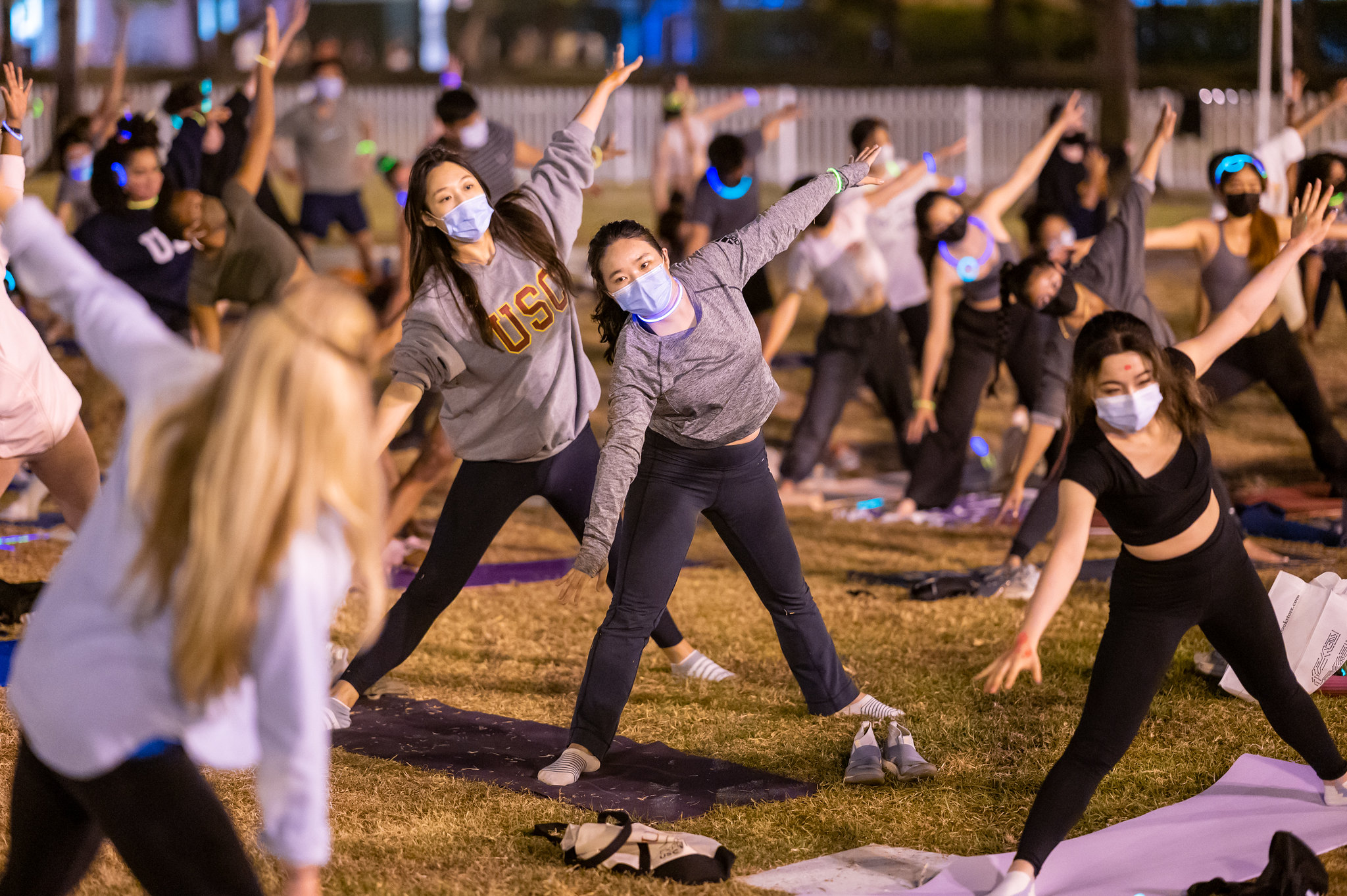 group of students doing yoga