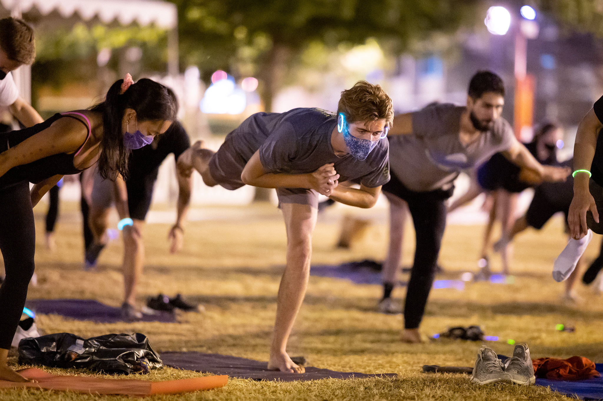 masked students doing yoga
