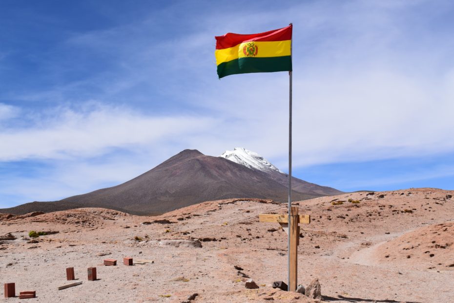Bolivian flag in desert