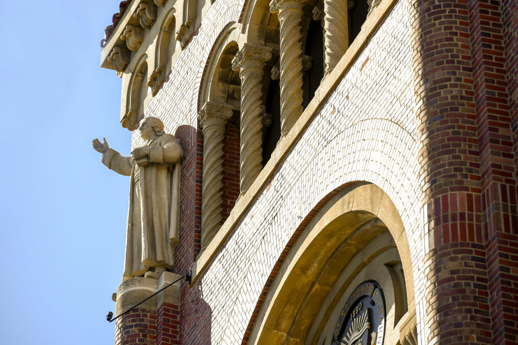 Statue on Bovard Auditorium Tower Photo by Gus Ruelas